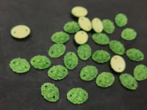 Green Matte Flower Oval Resin Stone (2 Hole- 14x10 mm)